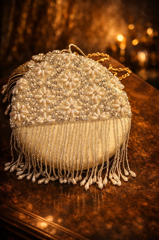 Embroidered Round Clutch with tassels